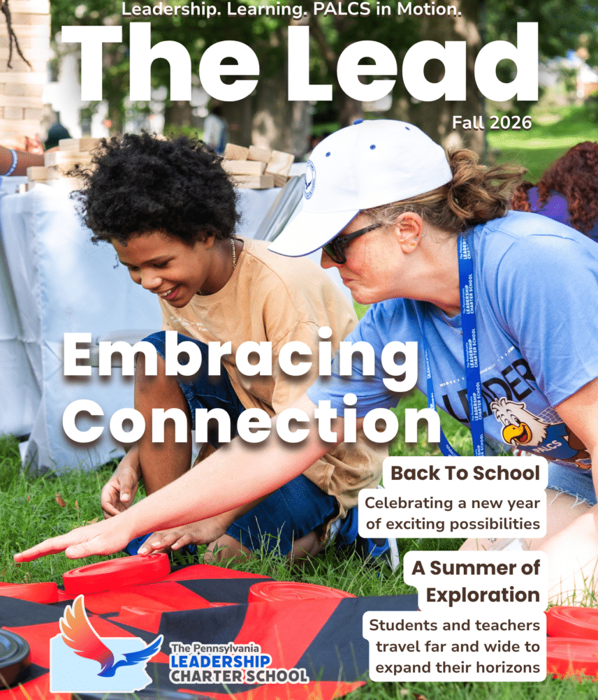 The front cover of the Fall 2026 edition of The Lead. The image is of a PALCS staff member and a PALCS student playing a yard game. The cover says "Embracing Connection." Additional headlines say "Back To School Celebrating a year of exciting possibilities" and "A summer of exploration: students and teachers travel far and wide to expand their horizons"