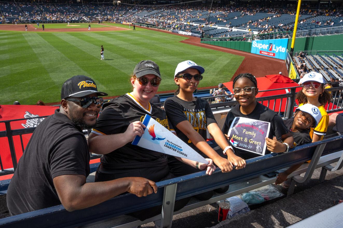 PALCS families pose for a picture together in the stands at PNC Park.