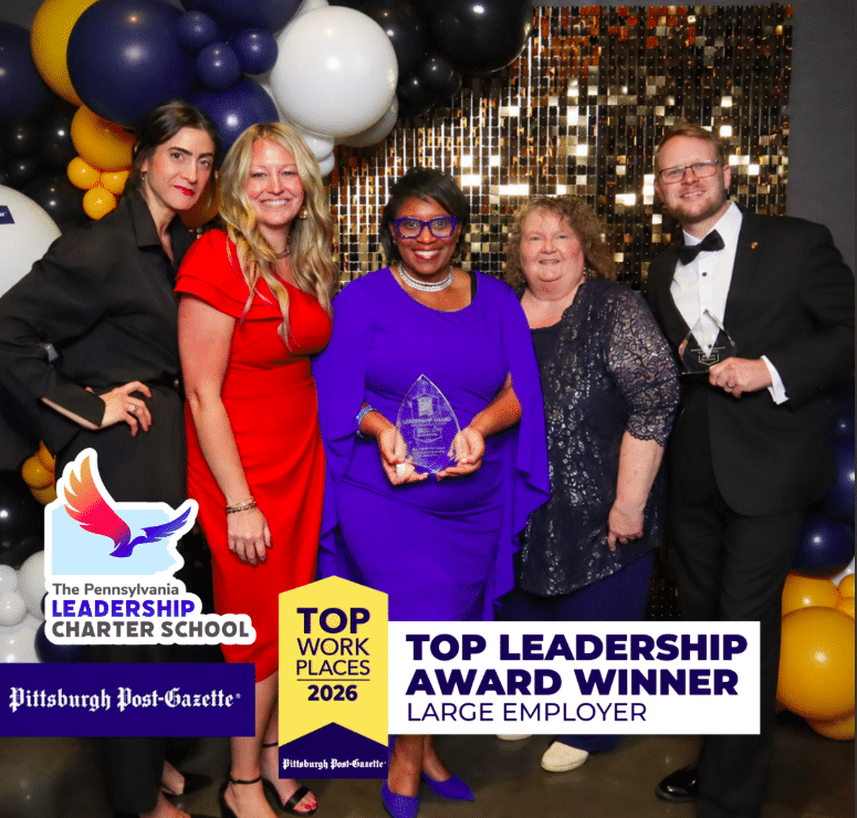 PALCS Employees (left to right) Director of School Communications Zealan Turner, Director of Student Services Carrie Longstreth, CEO Dr. Karla Johnson, Business Technology Teacher Barbara Gross, and Social Studies Teacher Nick Yund pose for a picture with the Top Workplaces award.